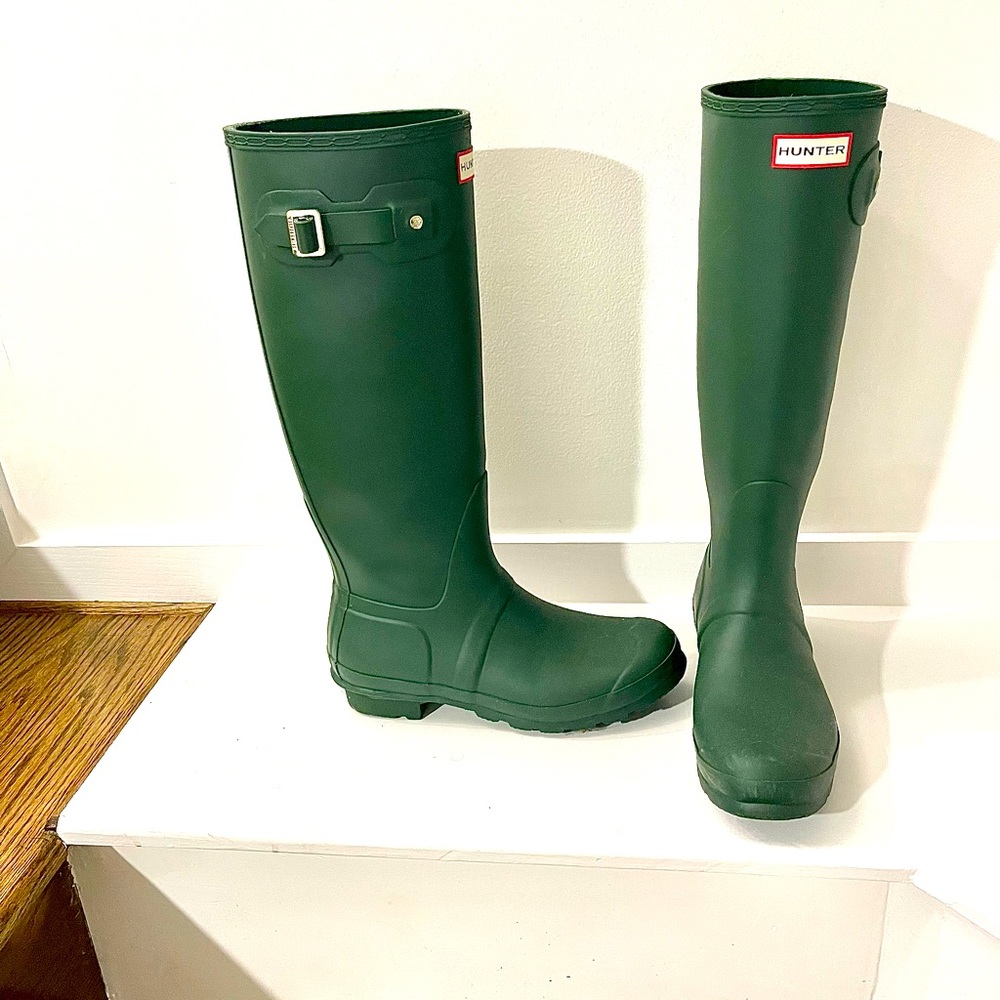 Green tall Hunter boots.